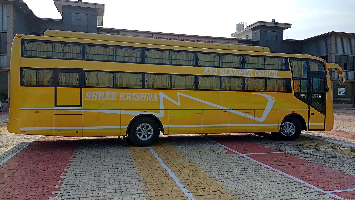 Shree Krishna Travels — side profile from the front quarter