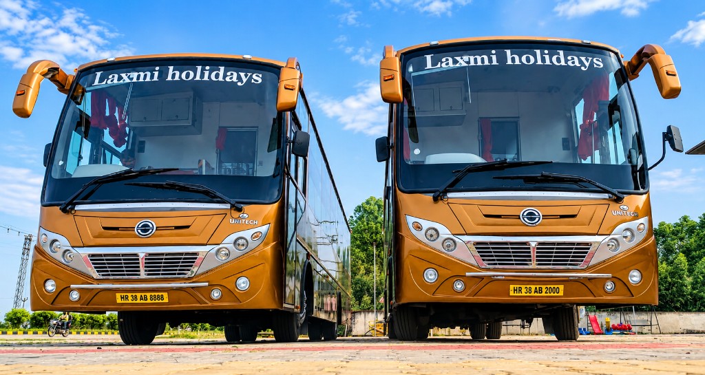Two Laxmi Holidays coaches built to the same specification, side by side before delivery
